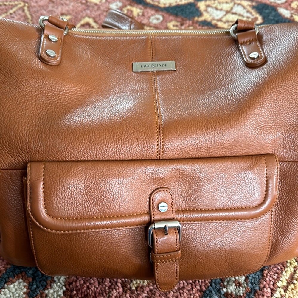 Lily Jade Meggan Diaper bag with insert and changing pad.